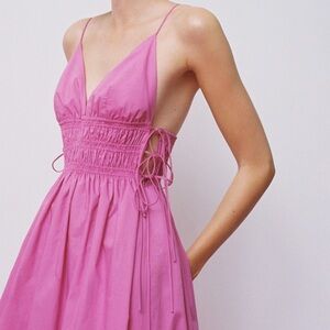Cotton dress with side ties